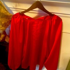 Red silk blouse